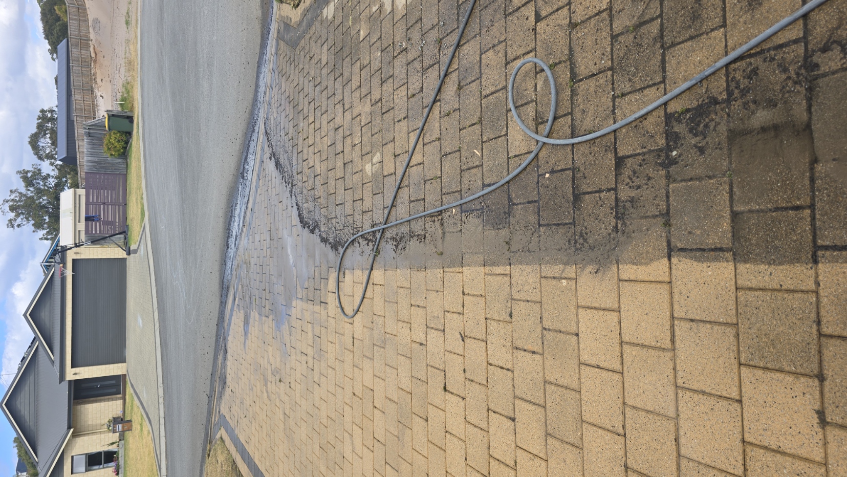 Soft washing a roof in Albany