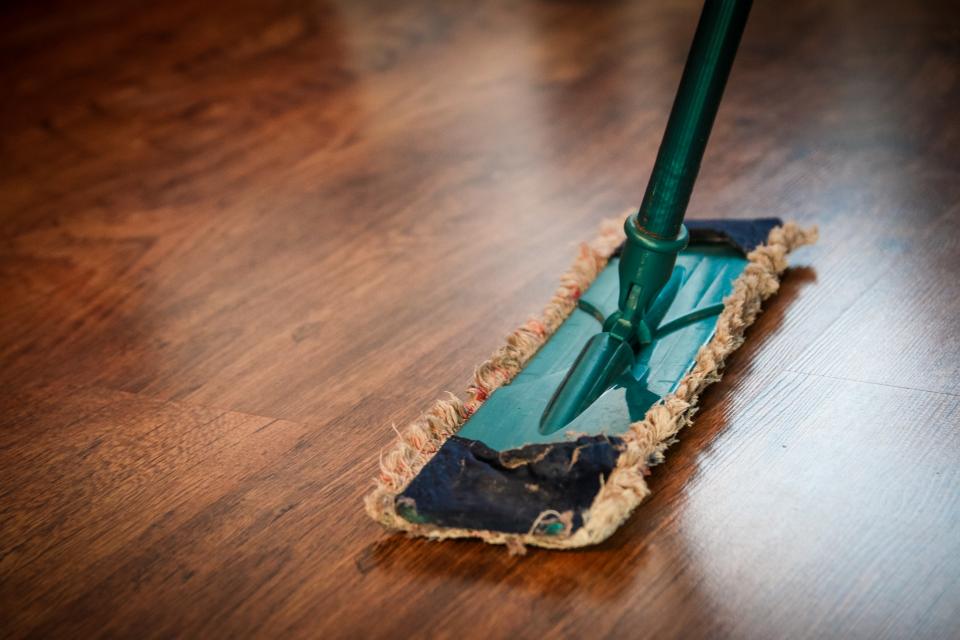 Mopping floors during an end-of-lease clean
